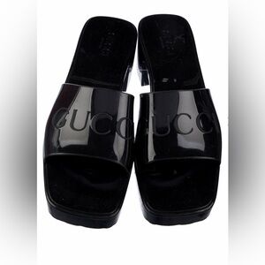 Gucci Glossy Black Embossed Logo Slide Sandals